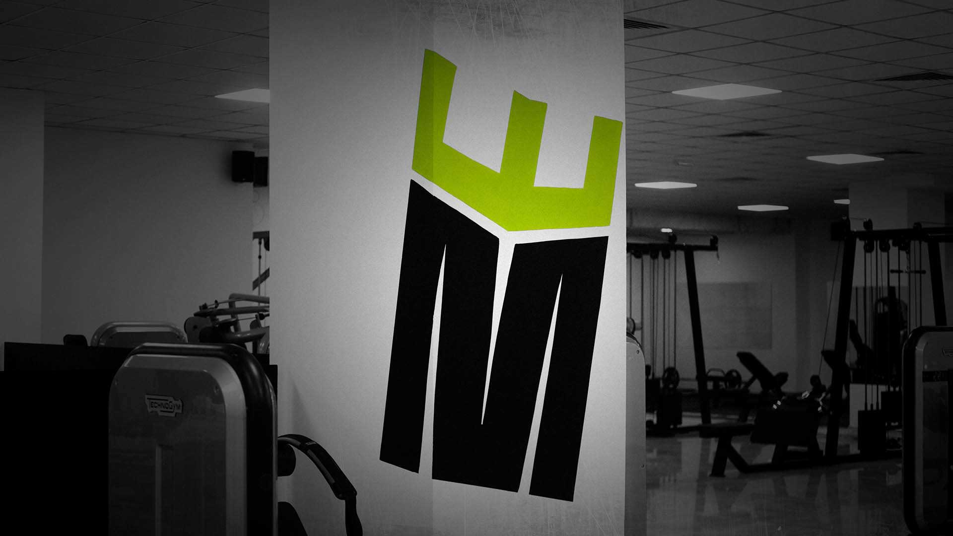 Imperial Gym & Fitness Logo Wall Mockup | Nebojsa Nask Graphic Design Imperial Gym & Fitness logo applied on gym wall, branding and logo design by Nebojsa Nask
